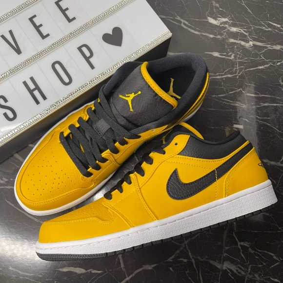 yellow and black jordan retro 1